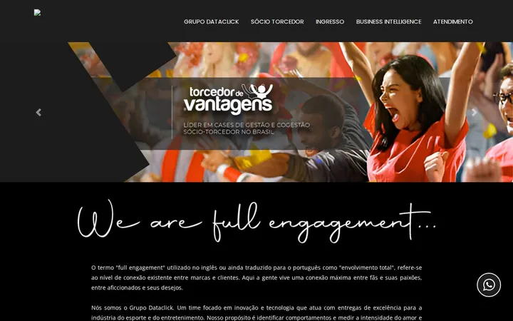 The Grupo Dataclick home page with cheering football fans